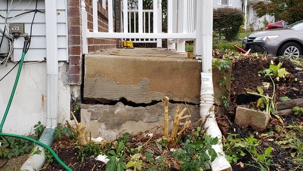 Erosion causes sunken concrete